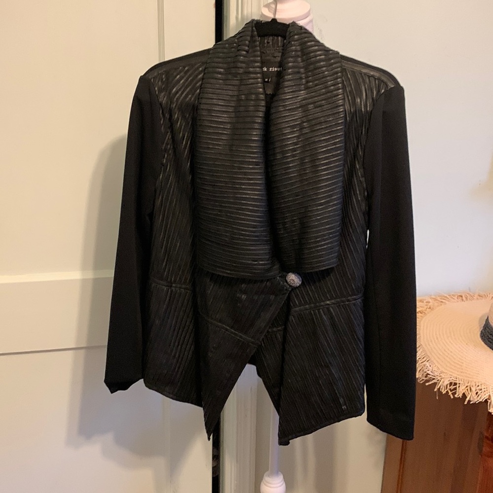Black Rivet faux leather and polyester jacket/open cardigan.Size M. Used.